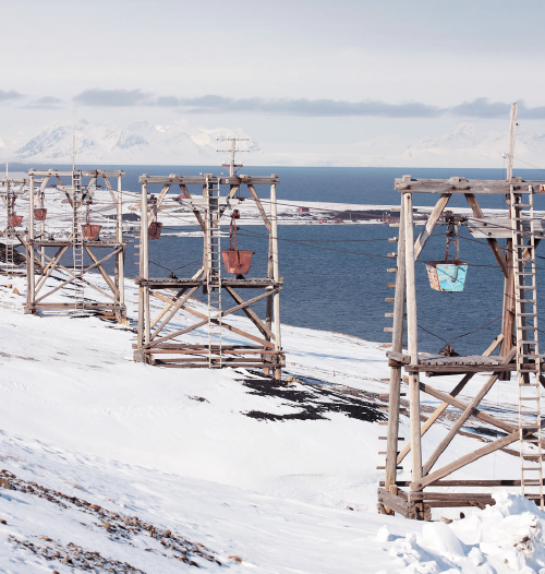 The abandoned cableway in this photograph used to transport coal from coal mines to the harbour in Longyearbyen, Svalbard.